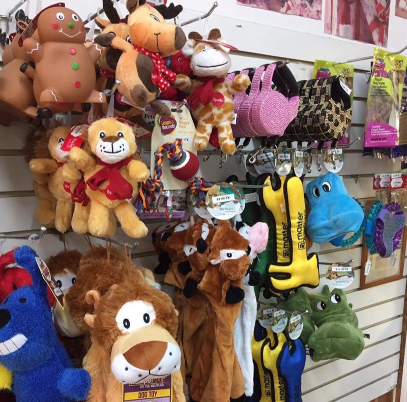 Pet supplies, treats and bows on the shop wall