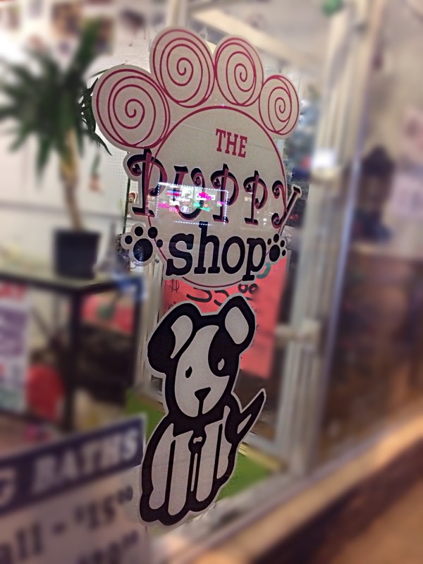The Puppy Shop window decal